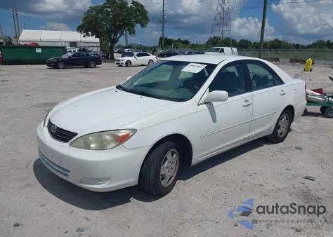 2003 Toyota Camry Le V6 z USA, uszkodzony, nr VIN 4T1BF32K03U054852